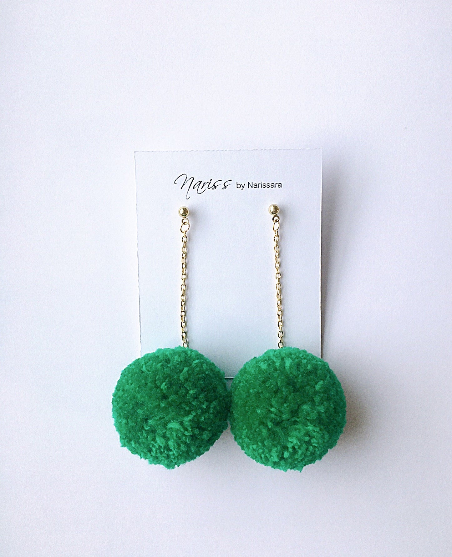 Green pom pom long chain earrings